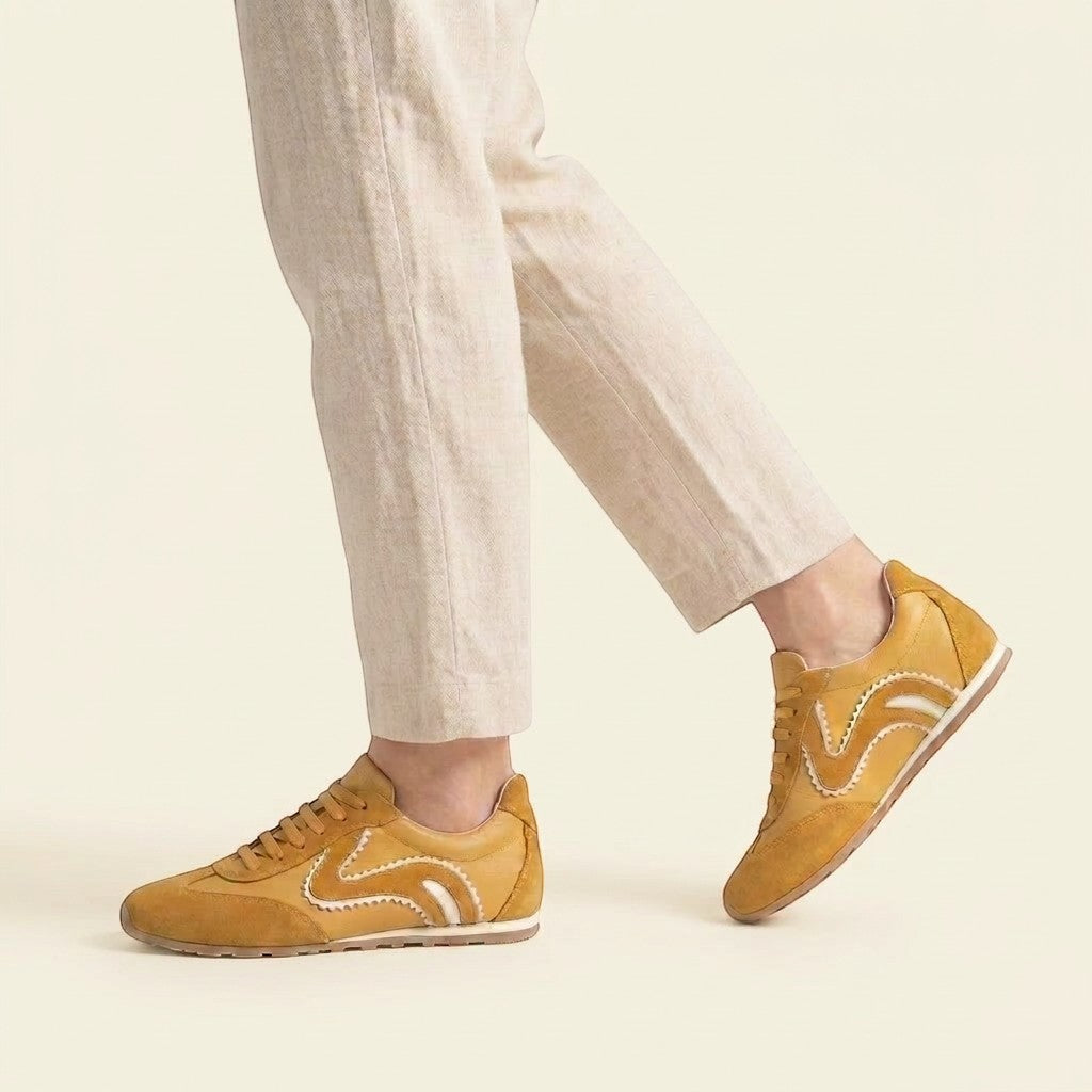 MrCalvano Pure Motion hardal rengi süet ve deri detaylı modern sneaker, yan kısımlarında zarif dikişli dalga desenleri ile.